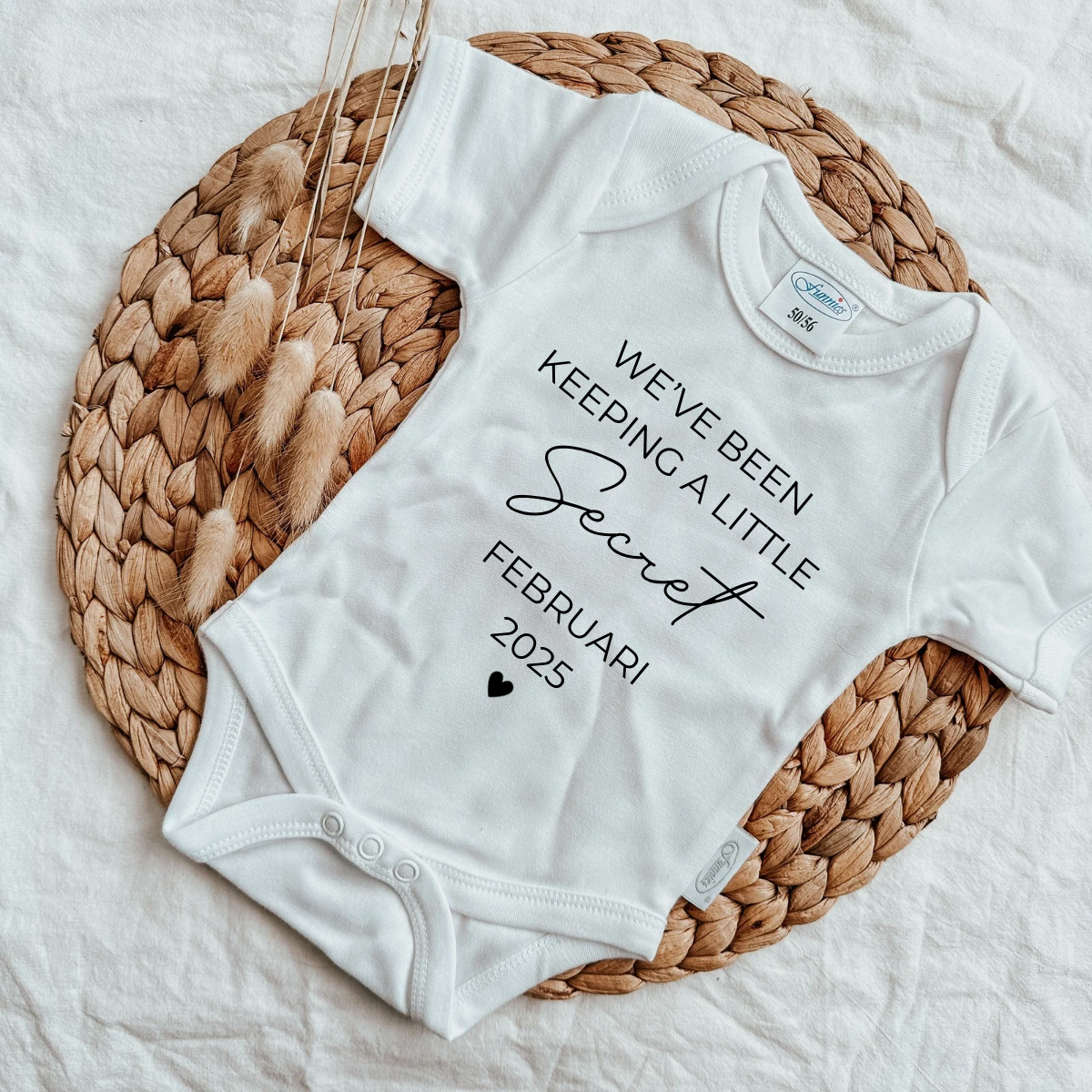 Zwangerschapsaankondiging romper secret